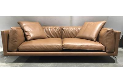 A Design Within Reach Giorgio Soressi Como sofa ($2,5/5,000) was designed by Giorgio Soressi upholstered with Kalahari leather, 90 by 42 by 30 inches deep.  