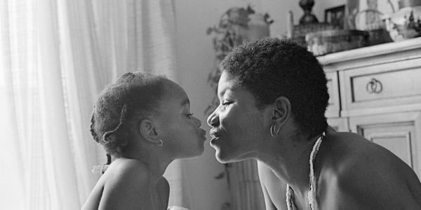 Joan E.  Biren.  Darquita with her daughter, 1990.  Archival inkjet print.  Courtesy the artist.