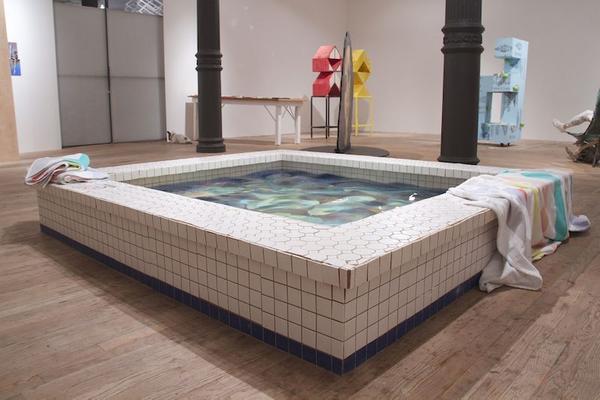 Caitlin Cherry "Mute City, Big Blue, Port Town", 2014.  Swimming pool (wood, ceramic tiles, plexiglass, water, chlorine) mounted over painting (oil on canvas), beach towels.  87 x 79.5 x 12 in.