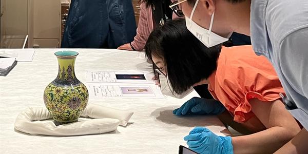 Curators and conservators from the Hong Kong Palace Museum (HKPM) work with the Palace Museum curators to perform condition checks for the newly arrived treasures from the Palace Museum.  © Hong Kong Palace Museum 