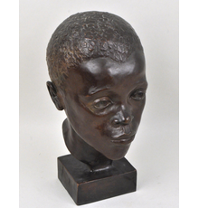 A bronze bust sculpture of an African-American Male attributed to Augusta Christine Savage (American, 1900-1962)