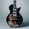 Gibson Guitar Corp.  (Kalamazoo, MI); painted by Keith Richards.  Les Paul Custom electric guitar (serial no.  7 7277), 1957; painted 1968.  Carved mahogany body and neck, ebony fingerboard, 24 3/4 in.  scale; black finish with hand-painted design; three patent-applied-for (PAF) humbucking pickups, three-way selector switch, two volume and two tone controls.  Collection of Keith Richards