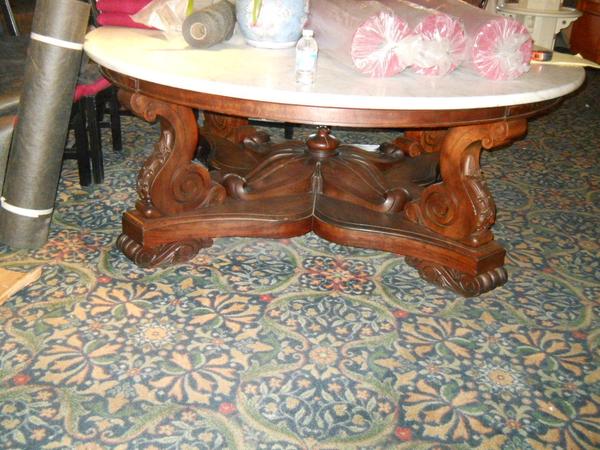 Marble top table on American Queen, during appraisal