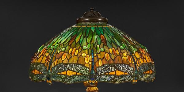 LOT 1: Tiffany Studios, shade design attributed to Clara Pierce Wolcott Driscoll rare Jeweled Drop Head Dragonfly table lamp: shade, #1507-15 on a telescoping reticulated Queen Anne’s Lace base, #397 Estimate $150,000-250,000 Sold for $545,000 