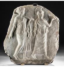 Marble relief of Minerva and Arachne, Roman Imperial Period, circa 1st to 2nd century CE, 18.1in high.  Accompanied by digital Art Loss Register Certificate.  Estimate $40,000-$60,000