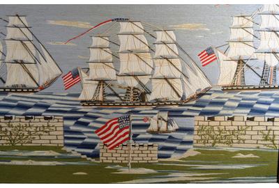 Rare American Sailor's Woolwork of a Fleet of American Frigates sailing Past an American Fort, Circa 1870.