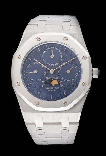 Fine and rare platinum Audemars Piguet Royal Oak Perpetual Calendar wristwatch, Ref.  D34714, with box and papers, purchased new in Paris in 1994.  Sold for twice the high estimate at $240,000