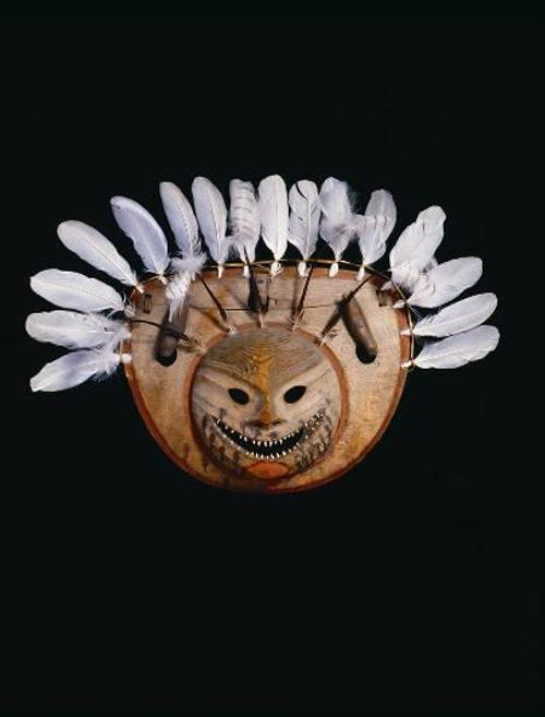 Nepcetat Mask, Arctic and Subarctic, ca.  1840–1860 Central Yup’ik, probably Lower Yukon River, Alaska Wood, swan feathers, old-squaw duck feathers, snowy owl Feathers, fox teeth, sealskin thong, reed, blood, pigment, ochre, and charcoal (feathers and teeth replaced) H: 22 in.  W: 33 in.  D: 3 3/4 in.  Thaw Collection, Fenimore Art Museum, Cooperstown, N.Y.  Photograph by John Bigelow Taylor.  Object ID: T0231