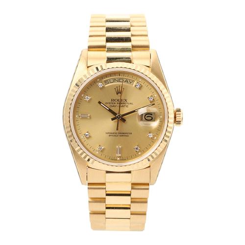 Rolex Day-Date “President” wristwatch, Ref.  18038, circa 1988, with 18kt yellow gold case and bracelet and champagne diamond dial, serviced by Rolex Aug.  2002 (est.  CA$28,000-$35,000).  