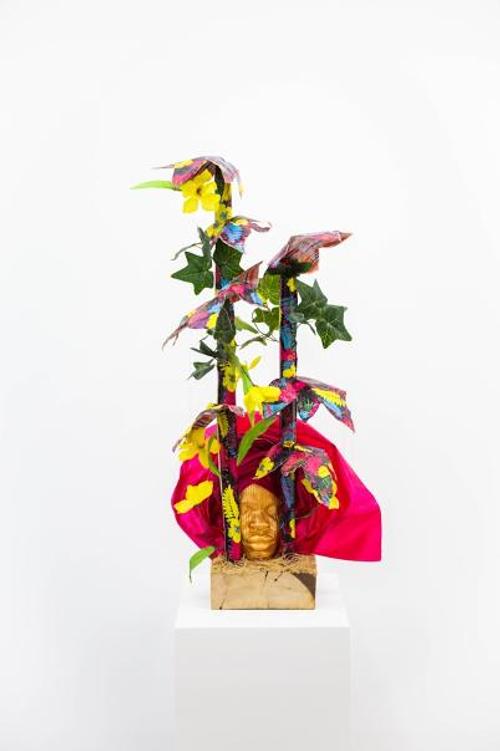 Layo Bright, Luffa Acutangula (Loofah), 2019.  Wood, Ghana-must-go-bag, Gele, Kan Kan, Foam, Plaster, Pigment, Wire, 39” x 17.5”x 18”