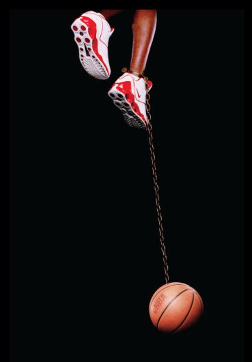 Hank Willis Thomas, Basketball and Chain, 2003.  Digital C-print, 99 x 55 inches.  Courtesy of Rubell Family Collection, Miami