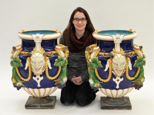 Monumental pair of circa 1865 Minton (England) majolica Bacchus vases, urn form molded and applied with satyr masks between foliate pomologic swags (est.  $2,000-$3,000).