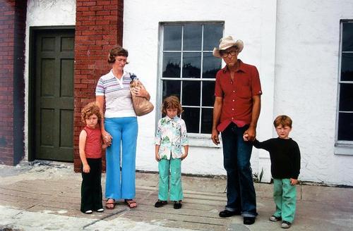 Mitch Epstein, Ybor City, Florida (Mother with Brown Paper Bag), 1983, Chromogenic Dye Coupler Print, 20 x 24 inches, edition 5/10 