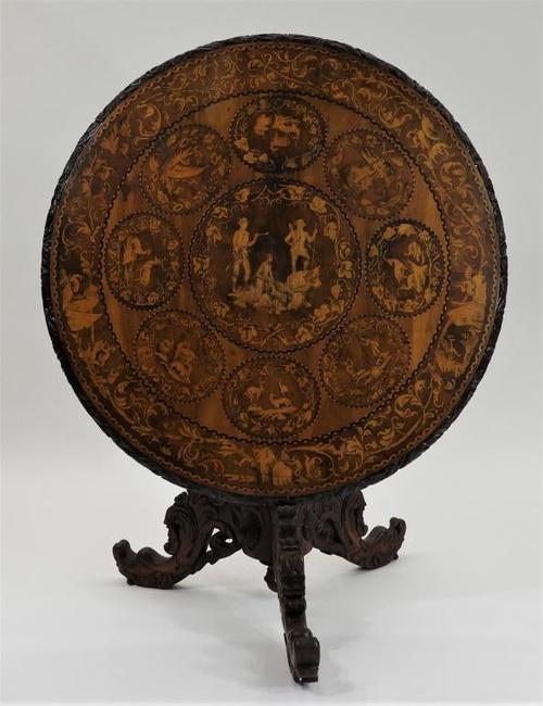 19th century Dutch marquetry tilt-top breakfast table, highly detailed, round-top table boasting hunting scenes and an intricate openwork apron, 29 ½ inches by 38 inches (est.  $1,000-$1,500).