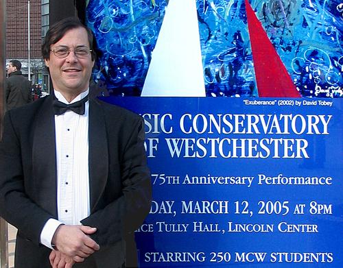 Honoree at the Alumni Reunion: MCW alumnus, musician, educator and teacher David Tobey at Lincoln Center for the Conversatory's 75th Anniversary Concert at Alice Tully Hall in 2005.  Tobey's painting "Exuberance" appeared on posters for the event and on the concert program cover, and he also conducted part of the orchestral presentation.  