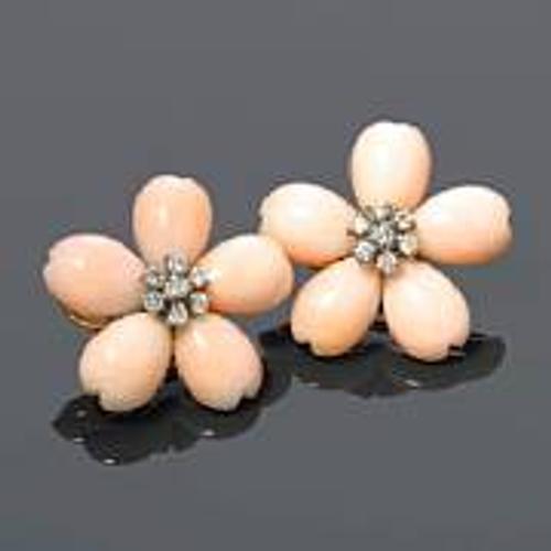 A pair of coral and diamond flower motif earrings Estimate: $1,400 - 1,600