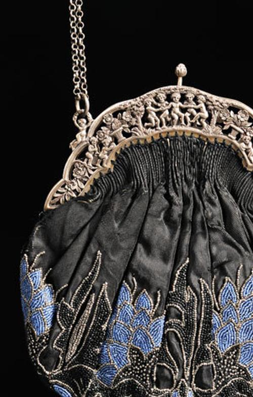 Beaded black silk purse with silver hardware, America, circa 1900