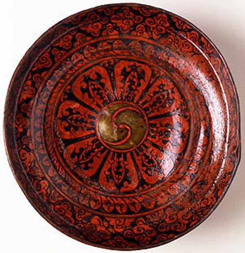 Lotus Dish 13th-15th century Tibet Painted leather Dia: 8 in.  Newark Museum.  Purchase 1998 Sophronia Anderson Bequest Fund .