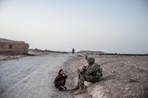 Boy with Soldier, 2010.  ©Ben Brody