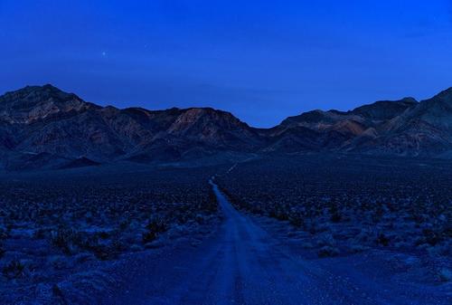 Sim Chi Yin, Singaporean, Mountain range surrounding the Nevada Test Site, from the series Most People Were Silent, November 2017.  Archival pigment print.  Harvard Art Museums/Fogg Museum, Richard and Ronay Menschel Fund for the Acquisition of Photographs, 2020.181.  © Sim Chi Yin; image courtesy of the artist.