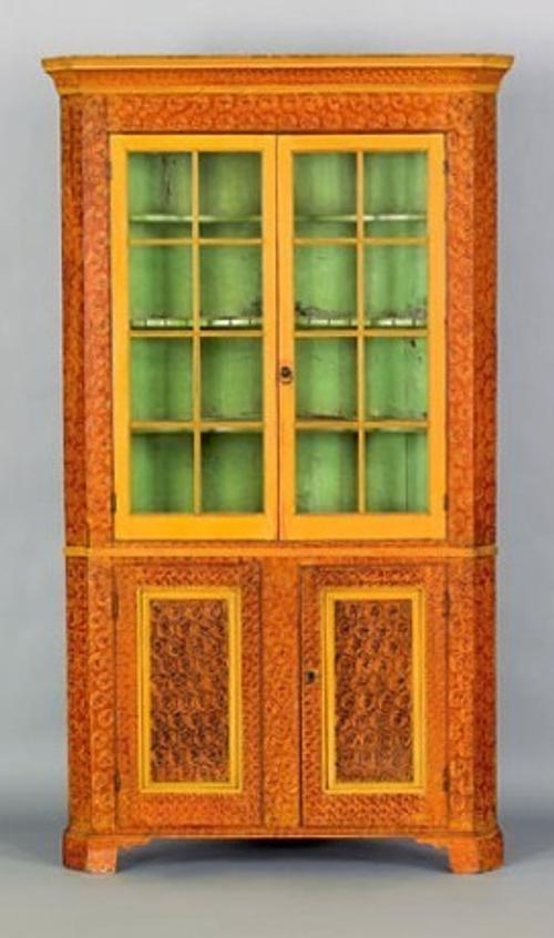 Penn.  two-part corner cupboard, 19th c., at Pook and Pook.