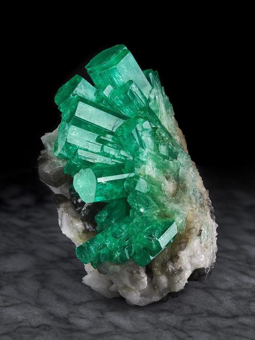 Emerald on Calcite, Coscuez Mine, Muzo Municipality, Vasquez-Yacopí mining district, Boyacá Department, Colombia.  9 cm height.  (currently in the collection of the Rice Northwest Museum)