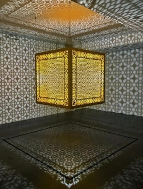 Anila Quayyum Agha, Hidden Diamond - Saffron, 2019, laser-cut, lacquered steel, 48 × 48 × 48 inches/122 × 122 × 122 cm 