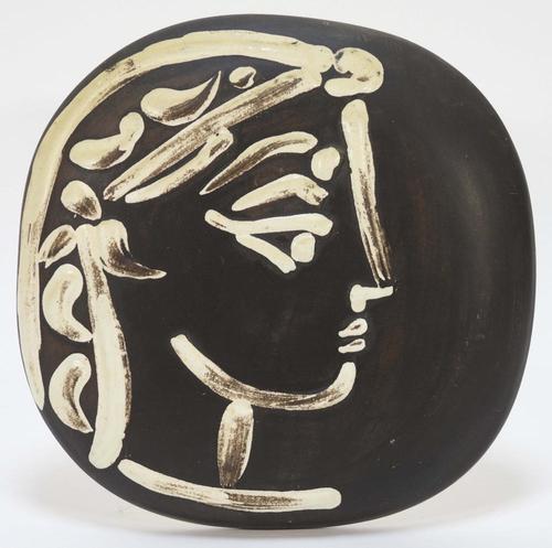 Ceramic face plaque by Pablo Picasso (Spain, 1881-1973) for Madoura, titled Jacqueline’s Profile (after Picasso’s wife, Jacqueline Roque) (est.  $2,500-$4,000).  