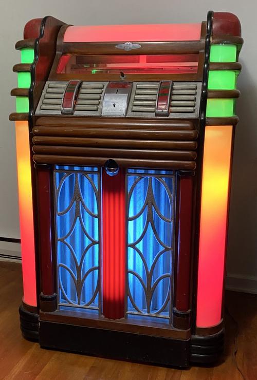 Rare and stylish 1938 AMI jukebox, an early example that’s rarely encountered, at auction or anywhere else.  Plays 78 rpm records.