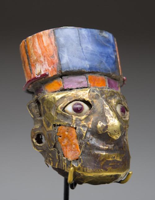 Huari Empire (Peru) carved wood head, pigment and gold.