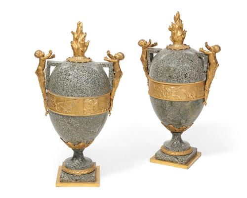 Pair of late 19th century Louis XVI style gilt bronze mounted granite urns, 32 inches tall by 17 inches wide by 11 inches deep (est.  $10,000-$15,000).