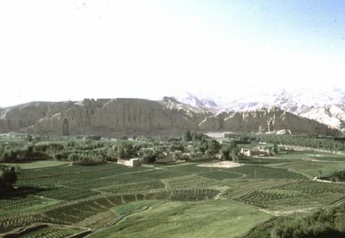 View of the sandstone cliffs on the north side of the Bamiyan Valley, Afghanistan, containing the niches with the Buddha images.  © D.  E.  Klimburg-Salter, 1971.  