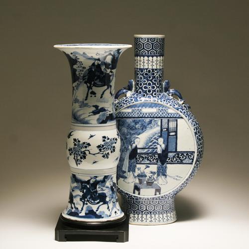 A pair of Chinese vases that will be offered in Antique Helper's March 19 Art and Antiques Auction.The cobalt and white beaker vase features a Kangxi Manchurian hunting scene; the other vase is a 19th Century moon flask.  