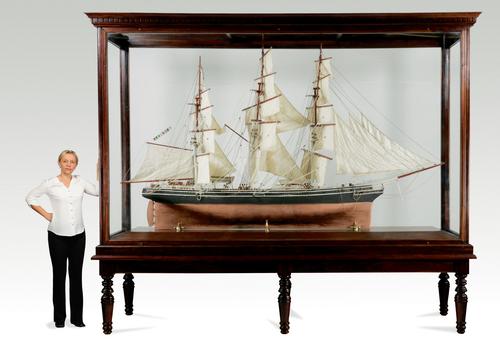 Large 20th century model of the three-masted clipper ship Thermopylae of the Aberdeen line with an overall size including stand of 145 ½ inches tall by 121 inches long (est.  $7,000-$9,000).