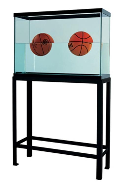 Jeff Koons Two Ball 50/50 Tank (Spalding Dr.  J Silver Series, Wilson Supershot), 1985.  Glass and steel tank with 2 basketballs in distilled water.  62.75 x 36.75 x 13.25 inches.  